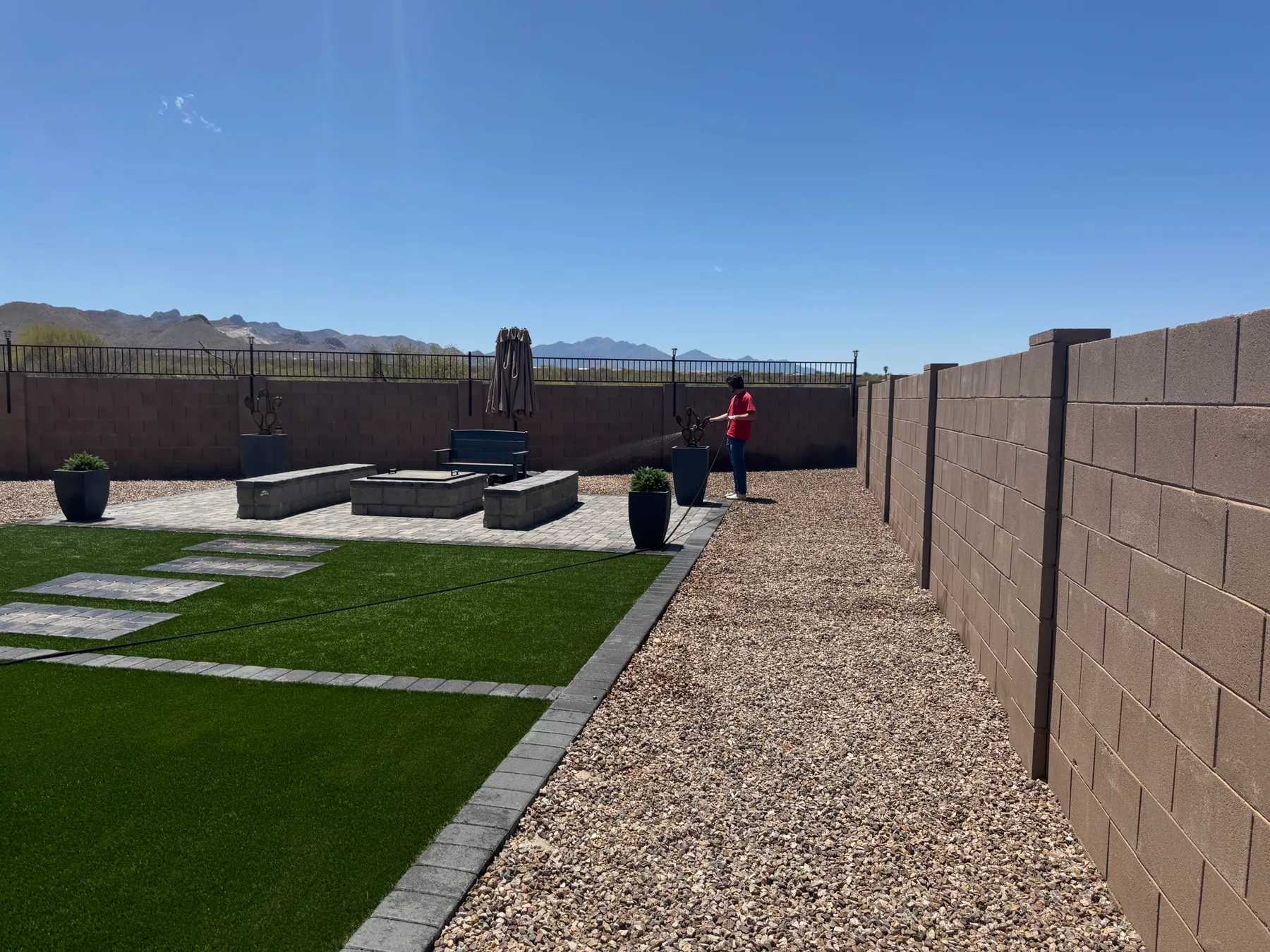 Tucson mountain-view yard with turf and gravel